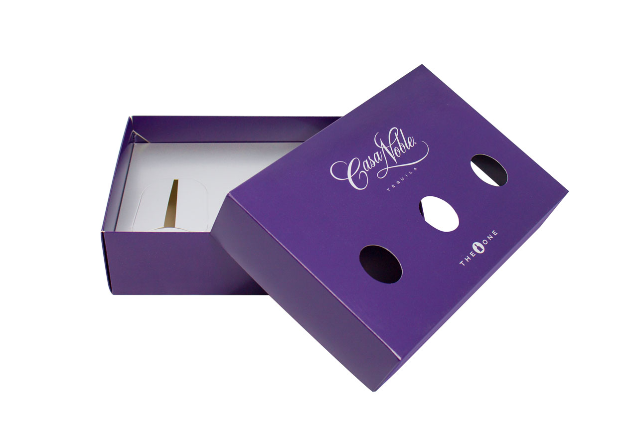 an image showing a purple colored die-cut gift box to hold liquor samples